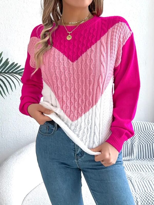 Moteriškas geometrinių formų rožinis megztinis apvalia apykakle